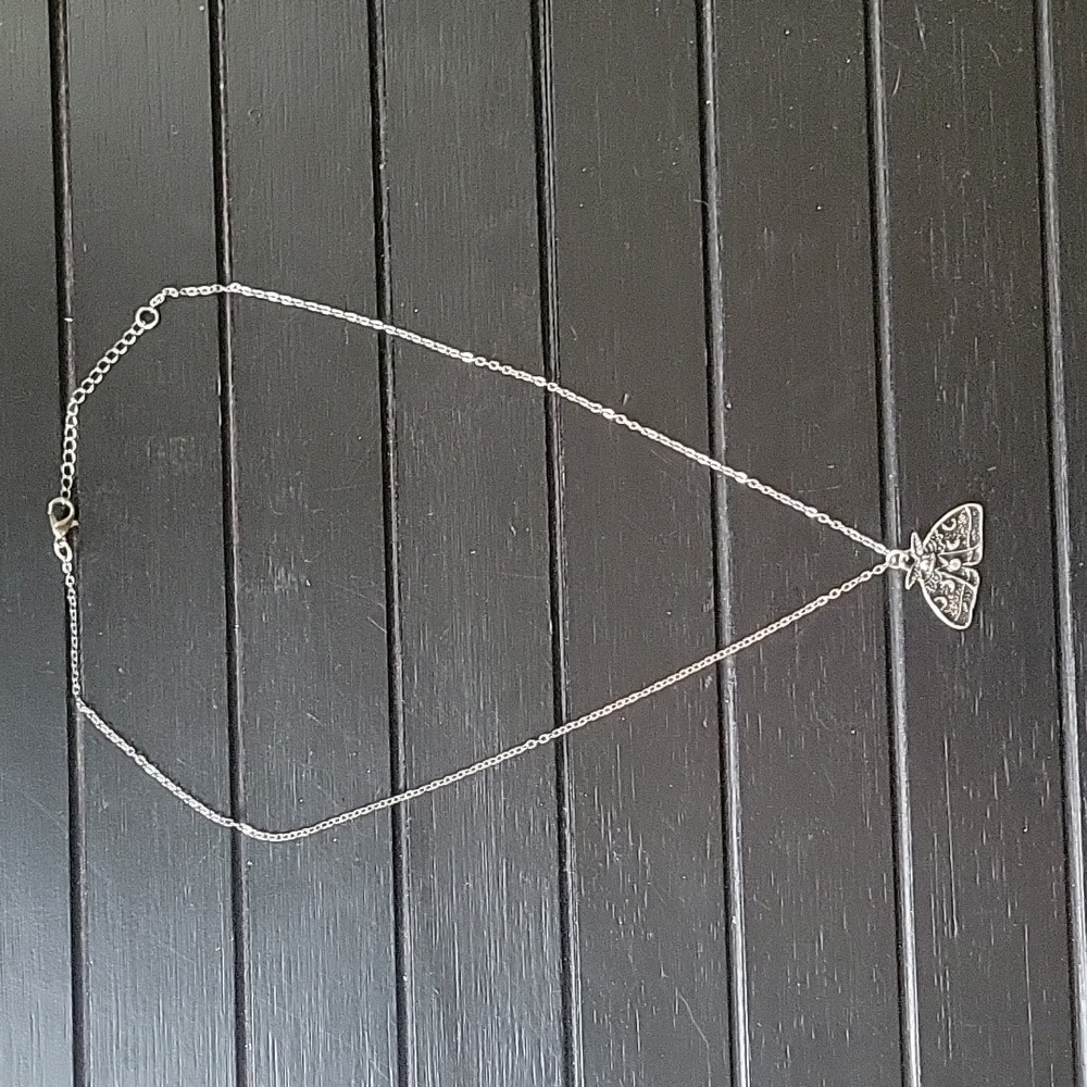 **BARELY WORN** Black and silver moon moth necklace Mens/Women's 17-18 inch